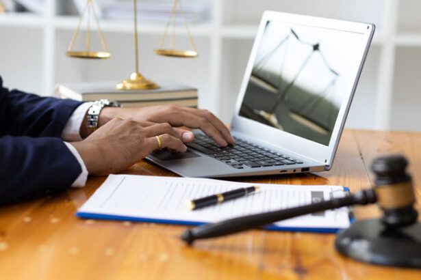 A lawyer reviews his firm’s fleet card usage at his computer.