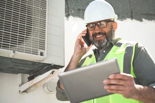 An HVAC owner reviews his fleet’s mileage in real-time on a tablet while at a work site thanks to a fuel card.